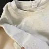 Camiseta Casual de Verano Suelta con Estampado de Graffiti y Letras para Mujer con Diseño de Nicho y Top Versátil para el Trabajo 2026