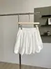 Falda Blanca de Cintura Alta para Mujer 2025 Primavera y Verano Nuevo Estilo Antiexposición Look Adelgazante Casual Falda de Capullo Coreana Color Puro Versátil
