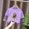 Camiseta de Manga Larga de Algodón Puro con Estampado de Dibujos Animados para Niñas, Estilo Nuevo de Primavera y Otoño 2026, Top de Rayas Falso de Dos Piezas T