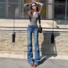 Jeans acampanados de cintura baja estilo chica picante americana para mujer, nuevos pantalones bootcut de pierna ancha elásticos adelgazantes de cintura alta, primavera 2026