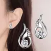 Weihua Tmall Dropshipping Brincos Asa de Anjo com um Temperamento Semelhante a uma Asa, Versão Coreana Comércio Exterior Brincos Asa de Anjo