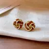 Nuevos Pendientes de Botón Retorcidos con Goteo de Aceite de Diseño Único Estilo Francés Otoño e Invierno con un Diseño de Nicho