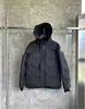 Chaqueta de plumón Putian Classy Big Goose 17 con capucha Etiqueta Roja y Negra Mismo Estilo para Hombres y Mujeres Chaqueta de plumón Engrosada Resistente al Frío de Moda