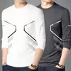 Camiseta de manga larga para hombre para primavera y otoño, disponible en blanco puro y negro, con cuello redondo, adecuada como capa base o camiseta interior, y un diseño fino y ligero para usar en otoño