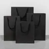 Venta al por mayor de bolsas de papel Kraft, bolsas de regalo para ropa, bolsas de embalaje, bolsas de regalo para compras, venta directa de fábrica.
