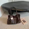 Bolso tote minimalista de nicho Ruien para mujer, nuevo modelo otoño 2026, bolsa de hombro o axila casual de gran capacidad para el trabajo