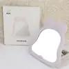 Espejo de Maquillaje Plegable de Escritorio con Forma de Lazo Espejo de Tocador de Dibujos Animados Espejo de Belleza para el Hogar Espejo de Retoque de Princesa en Stock