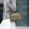 Bolso pequeño de moda para mujer, bolso casual simple de nailon, bolso de hombro, bolso de mano estilo coreano, bolso cruzado, bolso versátil y ligero para el día a día