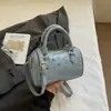 Bolsa Boston de Moda Coreana para Mulheres Verão 2025 Nova Bolsa Transversal de Nicho Bolsa Almofada Portátil Simples e Estilosa