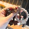 Corea del Sur Dongdaemun con anillo para el cabello de oso de pedrería, lindo para niña, banda para el cabello de alta elasticidad, cuerda para moño, estuche de cuero