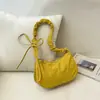 Bolsa de axila de nailon con cordón estilo francés en stock, modelo nuevo 2026, bolso de hombro de color liso fresco, bolso casual versátil y moderno