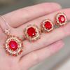 Tiktok en vivo venta caliente exquisito anillo de flor aretes colgantes collar cadena clavícula joyería de flor hueca de rubí