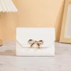 Bolsos de Mujer Más Vendidos Transfronterizos 2026 Bolsos Estilo Corto con Lazo 70% de descuento Cartera de Mujer con Botón a Presión Bolso Pequeño Barato Mini