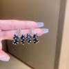 Pendientes de lazo negro francés, pendientes de estilo frío con un toque avanzado, diseño de nicho, primavera y verano, elegantes y versátiles joyas para las orejas.