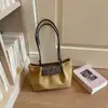 Bolso pequeño vintage de textura de alta calidad para mujer 2026 nuevo estilo moderno versátil de un solo hombro para llevar debajo del brazo bolso de mano para ir al trabajo