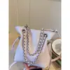 Bolsa de Corrente Texturizada Minimalista para Mulheres 2026 Nova Bolsa Transversal de Nicho Moda para o Dia a Dia Bolsa de Ombro Transfronteiriça