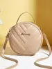 2025 Nova Moda Elegante Exquisito Elegante Em Relevo Forma de V Cor Sólida Ombro Único Transversal Bolsa Pequena Redonda Fábrica Atacado