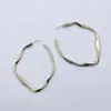 Europa y Estados Unidos aretes calientes transfronterizos nuevos creativos simples geométricos de torsión aretes retro personalidad aleación aretes al por mayor