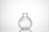 Punto Fabricante Fuente Mayorista Botella de Aromaterapia en Barra Volátil Vidrio Transparente Engrosado en Relieve Jarrón Pequeño Hogar Sencillo