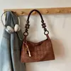 Bolsos de Gamuza de Moda de Este Año para Mujer 2026 Nuevo Estilo Moda Serie de Colores Maillard Bolso de Axila Bolso de Hombro Versátil con Estilo