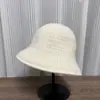 Sombrero de pescador de punto de color liso estilo coreano para mujer, estilo japonés, simple y cálido para otoño e invierno, hace que la cara se vea más pequeña, sombrero tipo cubo de moda de doble cara