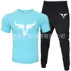T-shirt Masculina de Manga Curta e Calça Suit Casual Venda Quente Transfronteiriça Gola Redonda Cor Lisa Roupa Esportiva Casual com Estampas e Impressão