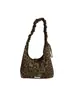 Nueva bolsa informal tipo dumpling de estilo coreano para otoño e invierno, estampado de leopardo vintage, bolsa de axila Y2K dulce y genial para ir al trabajo, bolso cruzado con cremallera