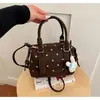 Bolsa pequena de luxo para mulheres, novo estilo outono e inverno 2026, bolsa transversal moderna, bolsa de mão feminina, bolsa Boston bowling