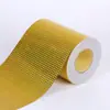 Venta al por mayor de fábrica Etiqueta de seguridad anti-falsificación con patrón de cuadros dorados material de etiqueta adhesiva PVC rollo de pegatina láser