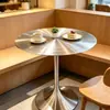 Mesa de comedor de acero inoxidable cepillado, popular en cafeterías, diseño simple con patas acampanadas, mesa redonda pequeña sólida para tiendas de té de leche, estilo industrial