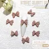 Ins Celebridad de Internet popular resina joyería para uñas al por mayor cinta de color lazo diy corbata de lazo tridimensional accesorios para uñas