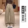 Calça de terno cinza escuro com caimento sofisticado, nova coleção outono 2026 feminina, cintura alta, solta, casual, plissada, perna larga
