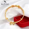 Pulsera para niños Xuping con borla de campana, imitación de oro, aleación de cobre, estilo de lujo ligero, diseño de empujar y tirar, joyería delicada y elegante para mujer
