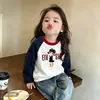 Camiseta infantil de manga longa com mangas raglan, nova coleção primavera e outono, top da moda para o início do outono para crianças, peça externa de algodão puro, camada base