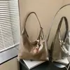 Bolsa de Tote Relajada Estilo Coreano Transfronteriza para Mujer 2026 Nueva Gran Capacidad Versátil para el Viaje Diario Bolso de Hombro