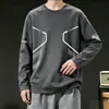 Camiseta casual versátil de manga comprida para outono para homens, gola redonda, cor sólida da moda, confortável, respirável e com caimento solto