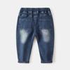 Meninos jeans versão coreana de calças infantis crianças desenho animado robô estampado calças baby jeans uma geração de maré de cabelo