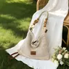 Bolsa de Praia Tecida para Férias na Costa Mulheres 2026 Nova Bolsa de Mão de Tricô Vazado Grande Capacidade Bolsa de Ombro Único