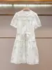 Shenzhen Nanyou Roupas Femininas de Alta Qualidade Verão Novo Francês Elegante Temperamento Cintura Marcada Emagrecimento Floral Manga Curta Vestido Feminino