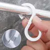 Gancho en forma de S creativo al por mayor gancho para abrigos hebilla a prueba de viento gancho S gancho gancho adhesivo dormitorio gancho de plástico sin rastro transfronterizo