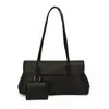 Bolso de axila de alta gama, nicho y sutilmente lujoso para mujer, con un nuevo diseño minimalista con patrón de lichi texturizado, estilo tote y correa para el hombro, perfecto para el día a día.