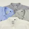Camisa de Linho Masculina 2026 Verão Nova Moda Casual Simples Cor Sólida Lapela Camisa Masculina de Manga Curta Atacado