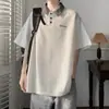 Camisa polo de trabajo resistente estilo americano con retazos y cuello desplegable de manga corta para hombre, camiseta juvenil de verano moderna de corte holgado de alta gama