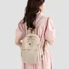 Mochila leve para esportes ao ar livre para estudantes universitários, resistente à água, de grande capacidade, leve, mochila casual de viagem para mulheres