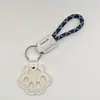 Novo pingente memorial criativo para guardar pelos de pet, porta-cartão de acesso à porta anti-perda, pingente de chaveiro de pata de cachorro