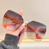 Gafas de Sol de Moda Sin Marco Estilo Nuevo, Gafas de Sol Versátiles de Gama Alta para Mujer, Gafas de Sol Modernas y Tendencia Anti-UV
