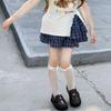 Conjunto de dos piezas de camiseta de manga corta de verano para niña y falda a cuadros 2025 Nuevo estilo Estilo infantil Top de media manga y falda Moderno