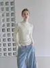 Otoño 2026 Nuevo Estilo Francés Elegante Cuello Alto Versátil para el Trabajo Sencillo Elegante Ajustado Top de Punto para Mujer Gris