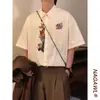 Verano Retro Americano Holgado de Moda Marca Bordado de Dibujos Animados Diseño Único Camisa de Manga Corta Tops para Hombres y Mujeres Camisas de Moda