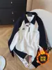 Sudadera de Terciopelo con Media Cremallera para Hombre 2025 Primavera y Otoño Nuevo Diseño de Empalme en Contraste de Color Blanco y Negro